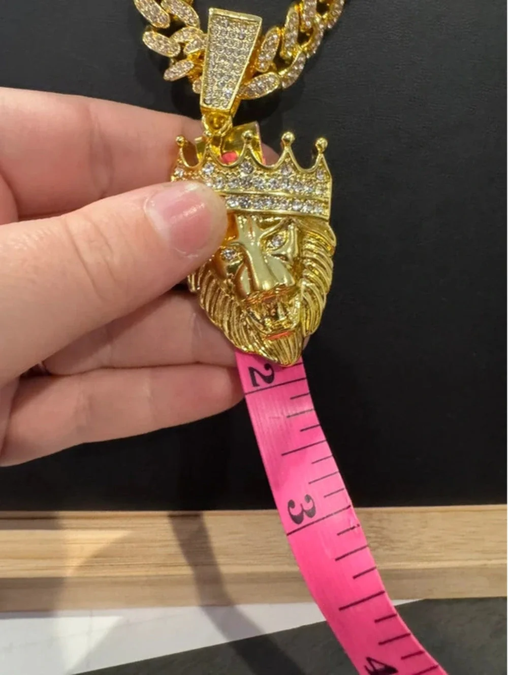 Iced out Cuban chain with lion head pendant 24” chain